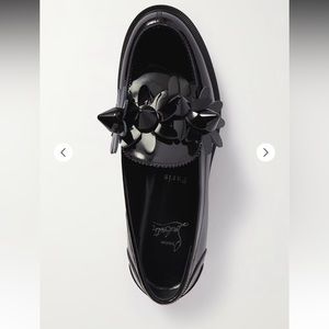 Christian Louboutin Daisy Spike Moc Flat
Size 38 1/2 in Patent Leather Loafers